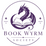 A circular purple logo featuring a stylized dragon wrapping around an open book, with the text 'BOOK WYRM SOCIETY' below on a white background.